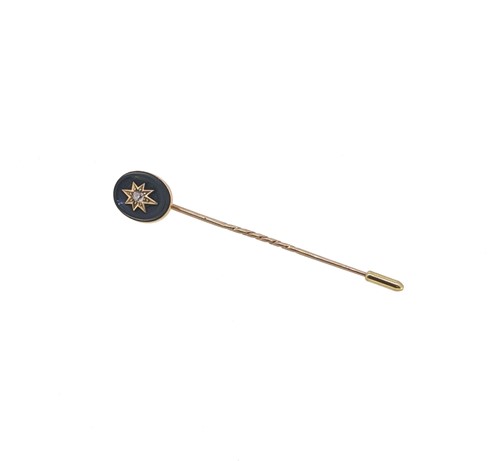 Lot 12 - An 18ct gold three stone diamond ring together with a diamond set stick pin
