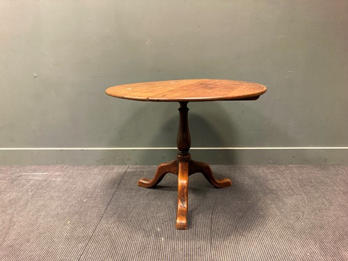Lot 607 - A 19th century circular oak tripod table, 71 x...