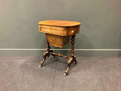 Lot 493 - A Victorian walnut work table with foldover...