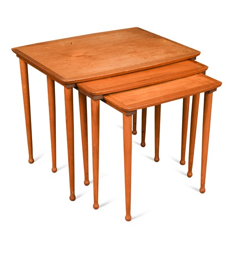 Lot 245 - A nest of three Danish teak tables