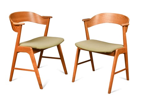 Lot 247 - Kai Kristiansen for Korup, a pair of Danish teak elbow chairs