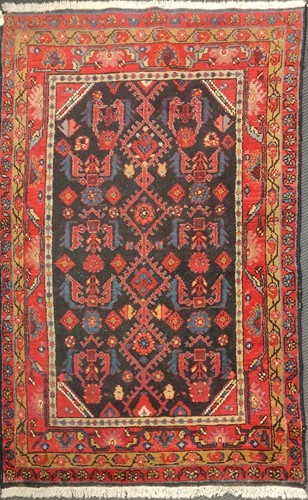 Lot 690 - Three hand-knotted Persian rugs, 178 x 109cm,...