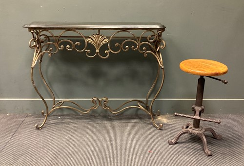 Lot 518 - A 20th century wrought metal console table...