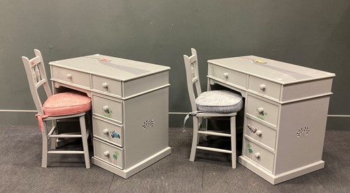 Lot 517 - Two children's grey painted kneehole desks and...