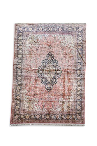 Lot 604 - A Persian silk rug, the central medallion...