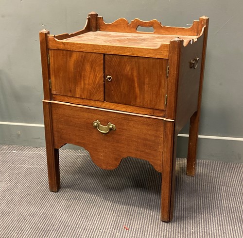 Lot 551 - A George III mahogany bedside commode, with...