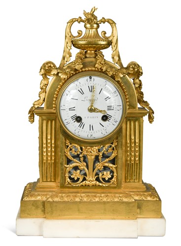 Lot 688 - A Louis XVI ormolu mantel clock