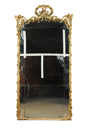 Lot 710 - A carved gilt wood pier mirror, mid-19th century