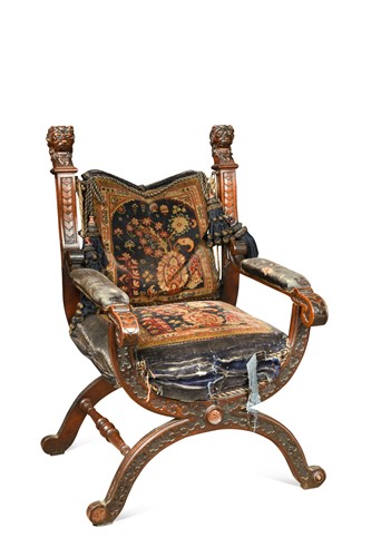 Lot 859 - A  Florentine carved walnut Savonarola chair, 19th century
