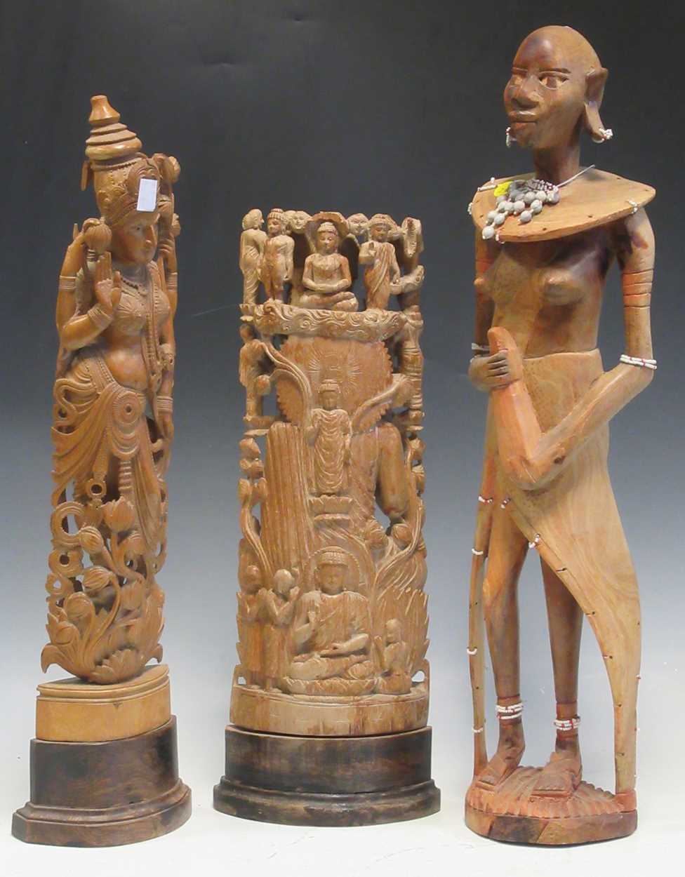 Lot 12 - Two modern Thai figures and a carved wooden...
