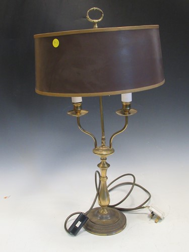 Lot 119 - A brass two-branch lamp, 70cm high