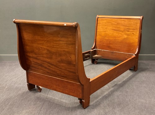 Lot 552 - A 19th century mahogany single sleigh bed,...