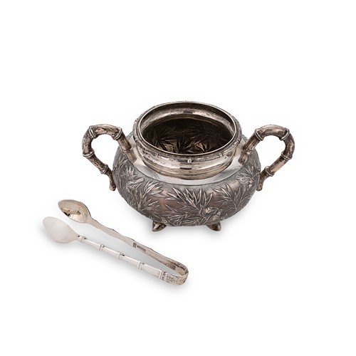 Lot 326 - An early 20th century Chinese export metalwares sugar bowl and associated nips