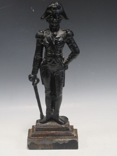 Lot 120 - A Victorian cast iron door stop modelled as...