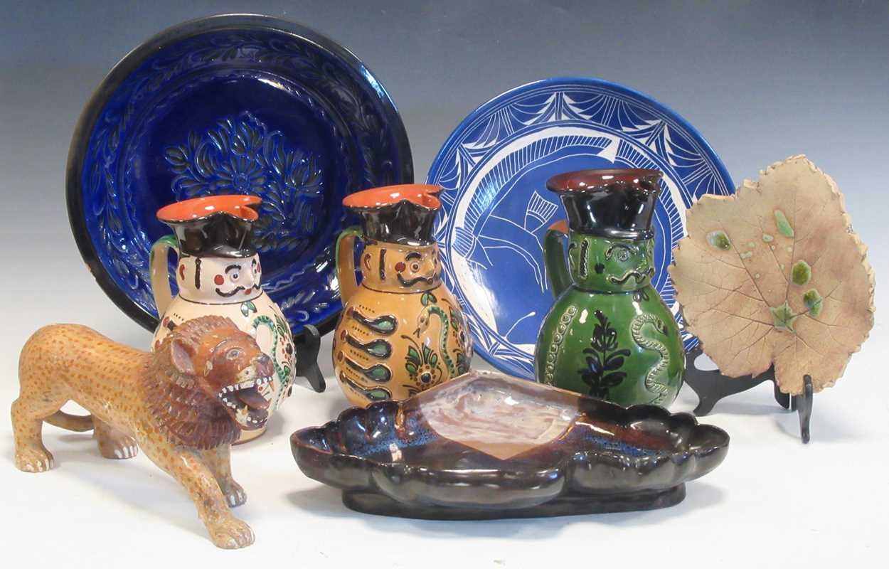 Lot 18 - A Wooden model of a lion, a pottery...