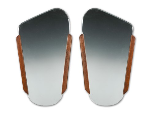 Lot 278 - A pair of  asymmetric wall mirrors, probably Danish circa 1970