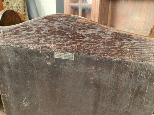 Lot 163 - A Heal's style Arts & Crafts oak bookcase