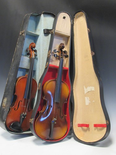 Lot 99 - Two violins in cases