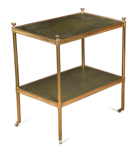 Lot 742 - A brass and leather étagère, 20th century