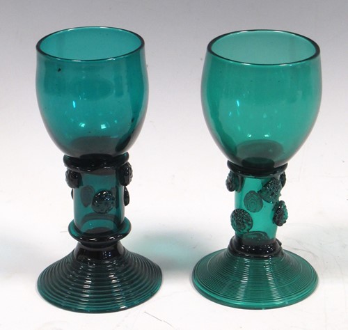 Lot 62 - Two green glass roemers with prunts, 14cm high...