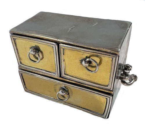 Lot 260 - A (possibly) 18th century continental metalwares parcel gilt miniature chest of drawers