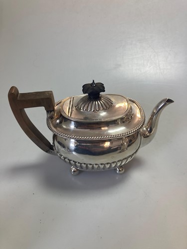 Lot 248 - A silver teapot and milk jug, together with a...