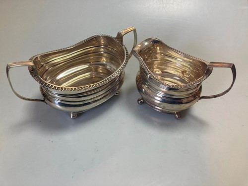 Lot 247A - A silver milk jug and two handled sugar bowl,...