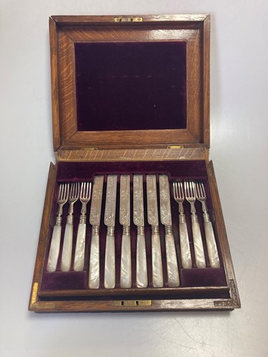 Lot 249 - A cased set of 12 pairs of silver bladed and...