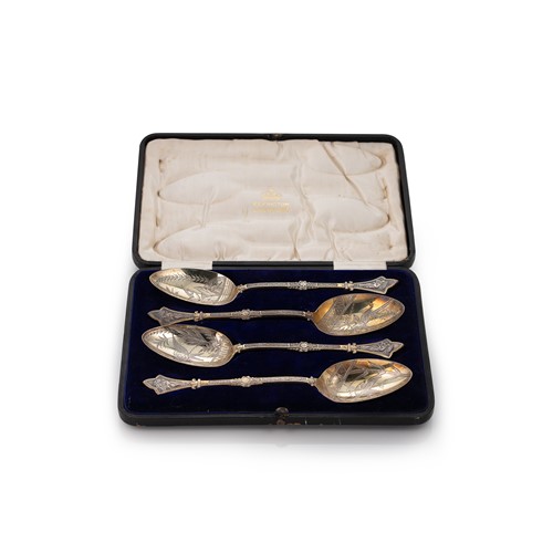 Lot 375 - A cased set of four Victorian silver gilt serving spoons