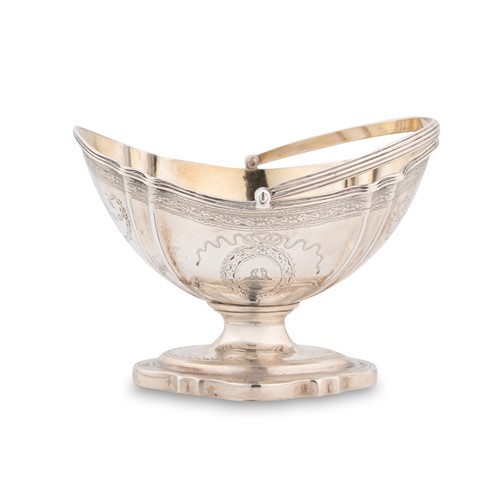 Lot 344 - A George III 18th century silver swing handled sugar basket