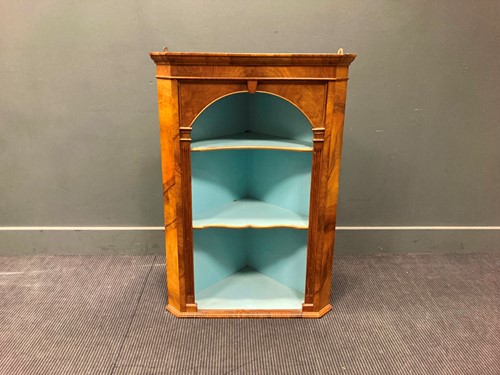Lot 488 - A George III style walnut corner cabinet, 20th...