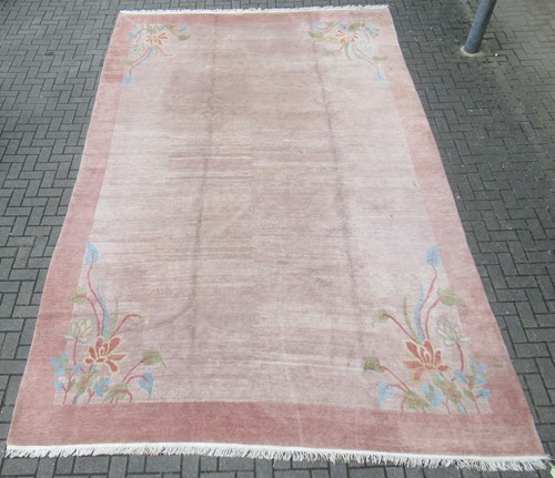 Lot 496 - A modern wool carpet, possibly after a Paul...
