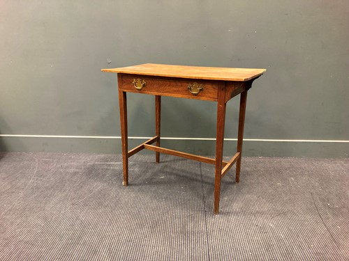 Lot 605 - An Arts & Crafts oak single drawer side table,...