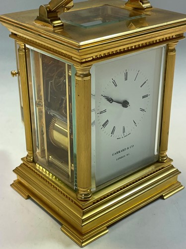 Lot 767 - A modern gilt brass carriage clock marked Garrard & Co