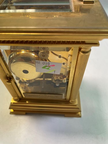 Lot 767 - A modern gilt brass carriage clock marked Garrard & Co