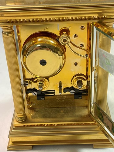 Lot 767 - A modern gilt brass carriage clock marked Garrard & Co