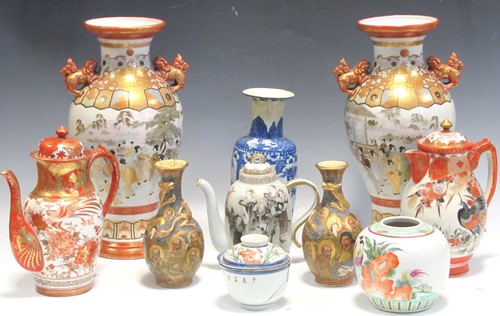 Lot 112 - A pair of Japanese Kutani vases with a dog of...