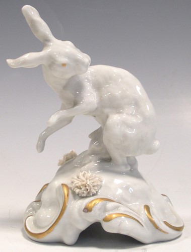 Lot 76 - A Vienna porcelain rabbit on naturalistic...