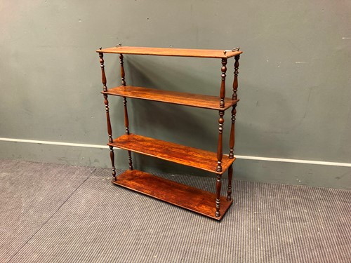 Lot 575 - A 19th century four tier hanging wall shelf...
