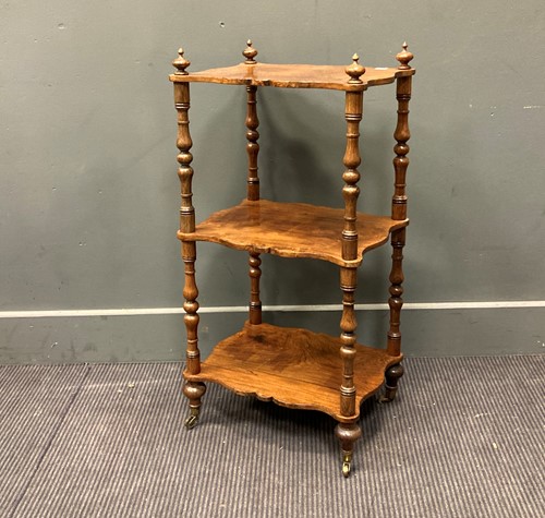 Lot 537 - A Victorian rosewood three shaped tier whatnot...