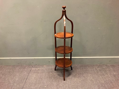 Lot 547 - An Edwardian mahogany three tier cake stand,...