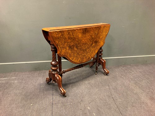 Lot 486 - A Victorian figured walnut drop flap...