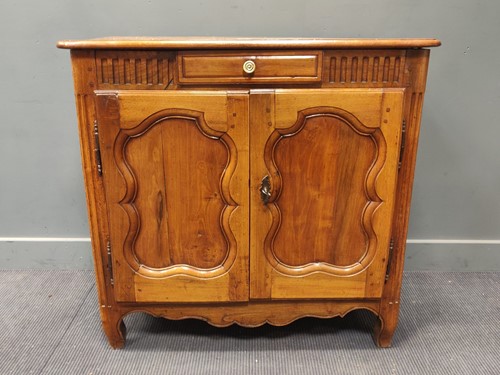 Lot 503 - A Louis XVI provincial style cherry wood side...