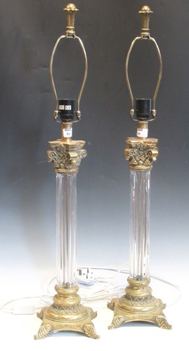 Lot 94 - A pair of brass/glass Corinthian column table...