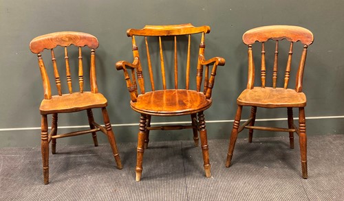 Lot 574 - An early 20th century mahogany stick back...