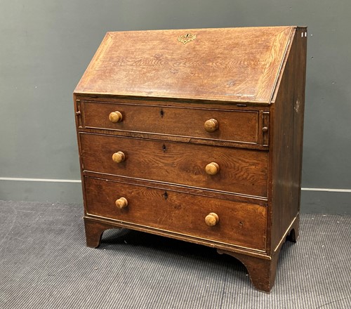 Lot 610 - A 19th century oak full-front bureau, 102 x 92...