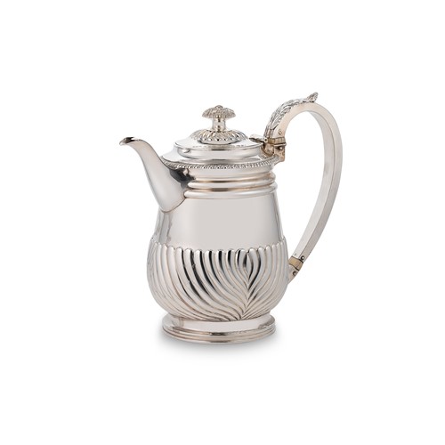 Lot 353 - A George III silver hot water jug