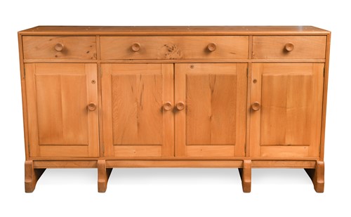 Lot 199 - A Cotswold style elm sideboard