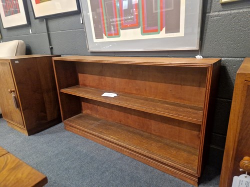 Lot 184 - A Cotswold School oak low bookcase
