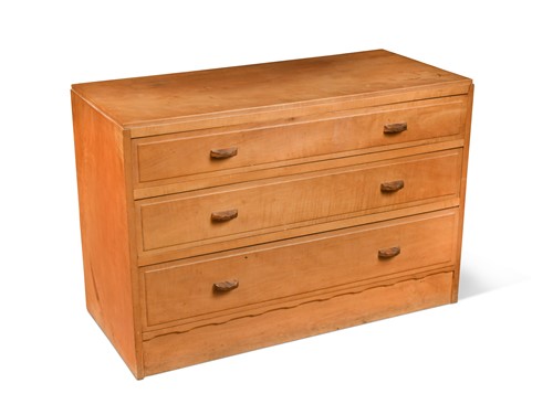 Lot 200 - A Cotswold School maple low chest of drawers